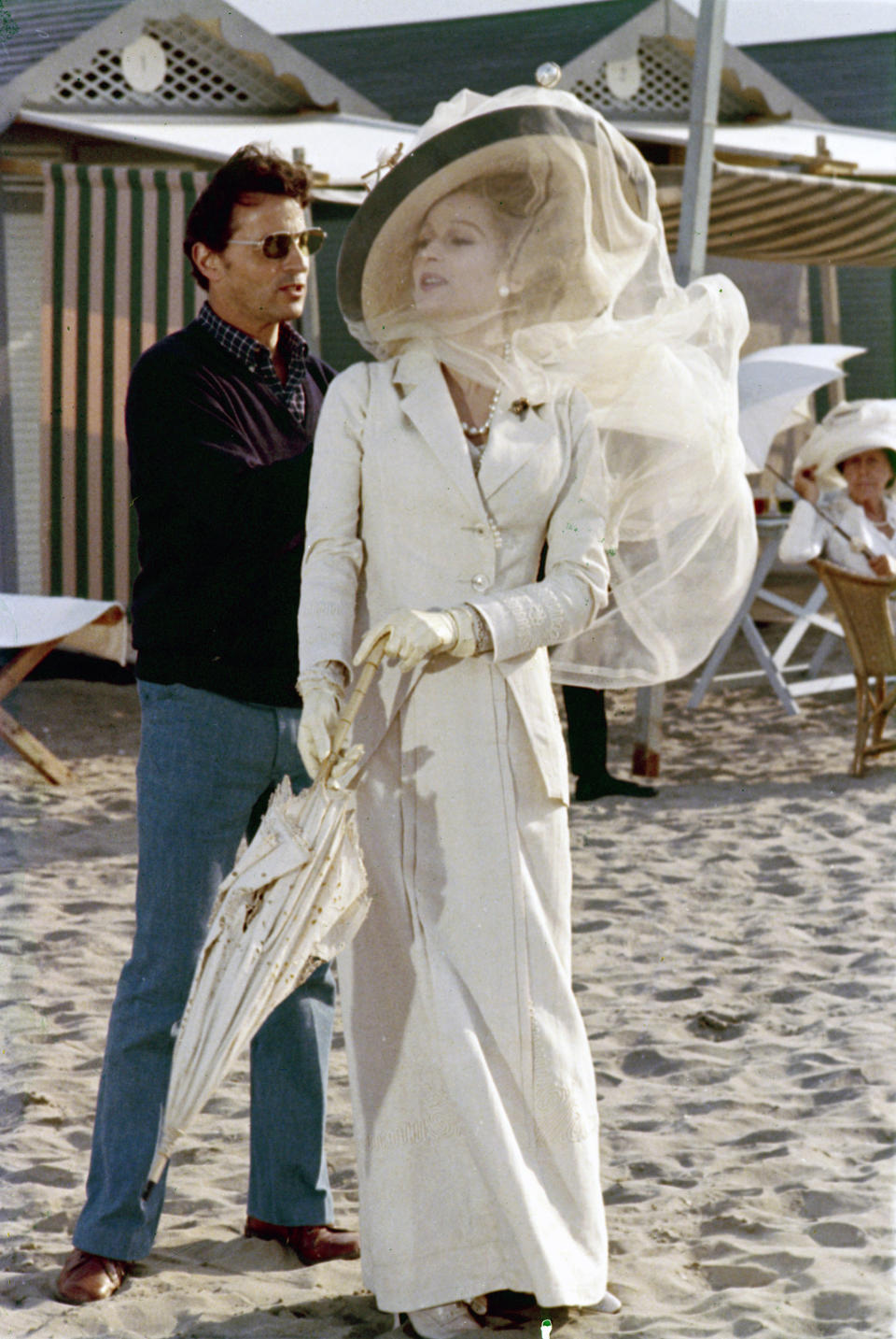 This 1971 photo released by AMPAS and courtesy of the Fondazione Centro Sperimentale di Cinematografia shows Costume Designer, Piero Tosi, left, and Silvana Mangano during production of the film, "Death in Venice." The Board of Governors of the Academy of Motion Picture Arts and Sciences will present Honorary Awards to Angela Lansbury, Steve Martin and Tosi, and the Jean Hersholt Humanitarian Award to Angelina Jolie. All four awards will be presented at the Academy's 5th Annual Governors Awards on Saturday, November 16, 2013, at the Ray Dolby Ballroom at the Hollywood & Highland Center in the Hollywood section of Los Angeles. (AP Photo/A.M.P.A.S./Fondazione Centro Sperimentale di Cinematografia)