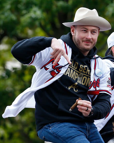 ATLANTA, GEORGIA - NOVEMBER 05:  Pitcher Tyler Matzek #68 of the Atlanta Braves celebrates during the World Series Parade through downtown on November 05, 2021 in Atlanta, Georgia. (Photo by Michael Zarrilli/Getty Images)