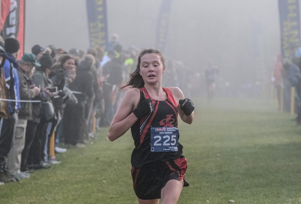 St. Johns junior Clara Fletcher finishes in first place in the Girls D2 Regional Cross Country race Saturday, Oct, 29, 2022.