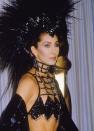 <p> Now known as her 'revenge dress', Cher's iconic black sequined outfit that she wore to the 1986 Oscars was designed by Bob Mackie and was reportedly worn as a protest against the Academy who had snubbed her performance in Mask. The feathered headdress was truly the star of the show as it towered above her. </p>
