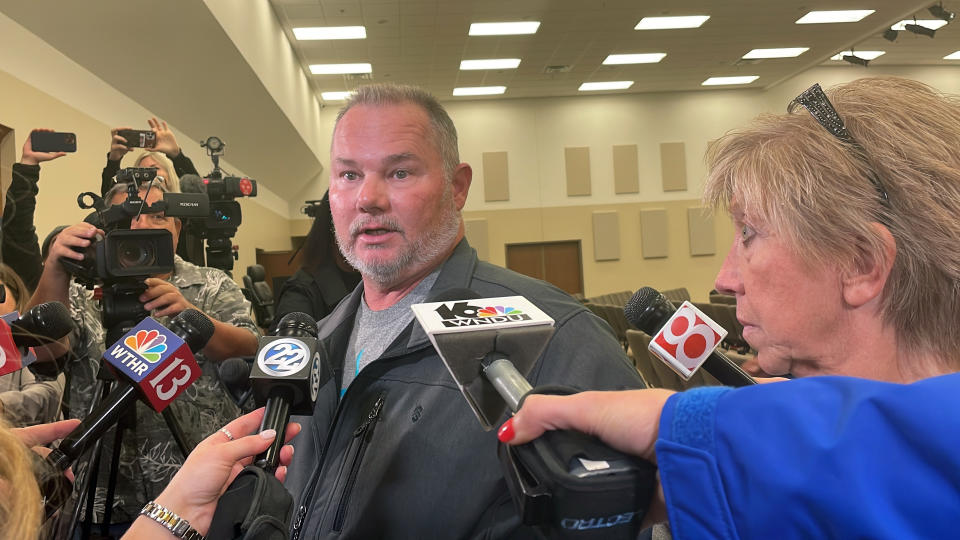 Grandparents of Liberty German — Mike Patty, left, and Becky Patty, right — speak with reporters after a news conference Oct. 31, 2022, in Delphi, Ind. Indiana authorities that day announced the arrest of a man in the unsolved slayings of German and her friend Abigail Williams, who were killed while hiking five years ago near their small community in northern Indiana. (Arleigh Rodgers/Report for America via AP)