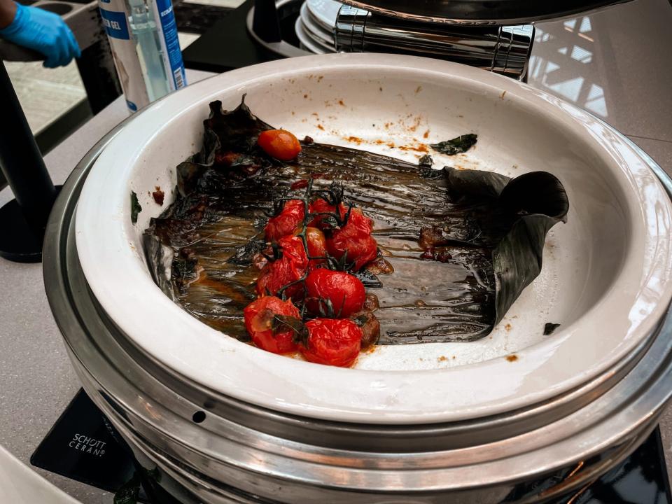 Near-empty buffet trays.