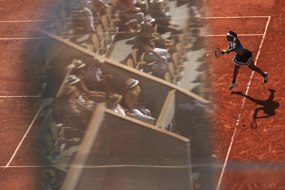 Coco Gauff of the U.S. plays a shot against Slovakia's Anna Karolina Schmiedlova during their fourth round match of the French Open tennis tournament at the Roland Garros stadium in Paris, Monday, June 5, 2023. (AP Photo/Aurelien Morissard)