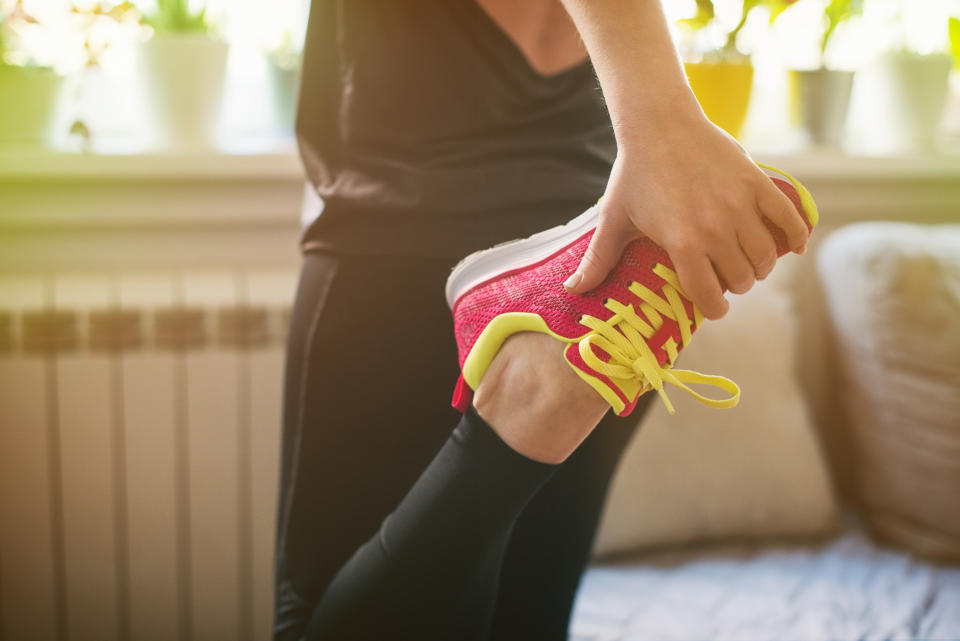 Young woman getting ready for morning exercising