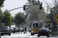 <p>Officers walk near a YouTube office in San Bruno, Calif., April 3, 2018. (Photo: Jeff Chiu/AP) </p>