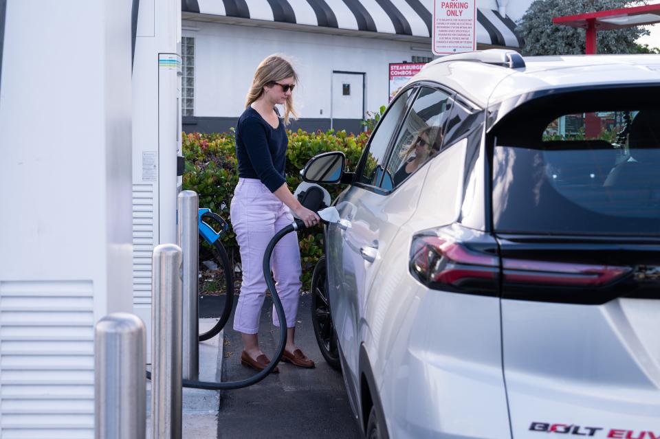 Palm Beach Post reporter Hannah Morse plugs a level 3 electric charger - the fastest kind of public charging station available to most electric vehicles - in to the Chevrolet Bolt EUV she test drove for a week on Tuesday, February 7, 2023, in Delray Beach, FL.