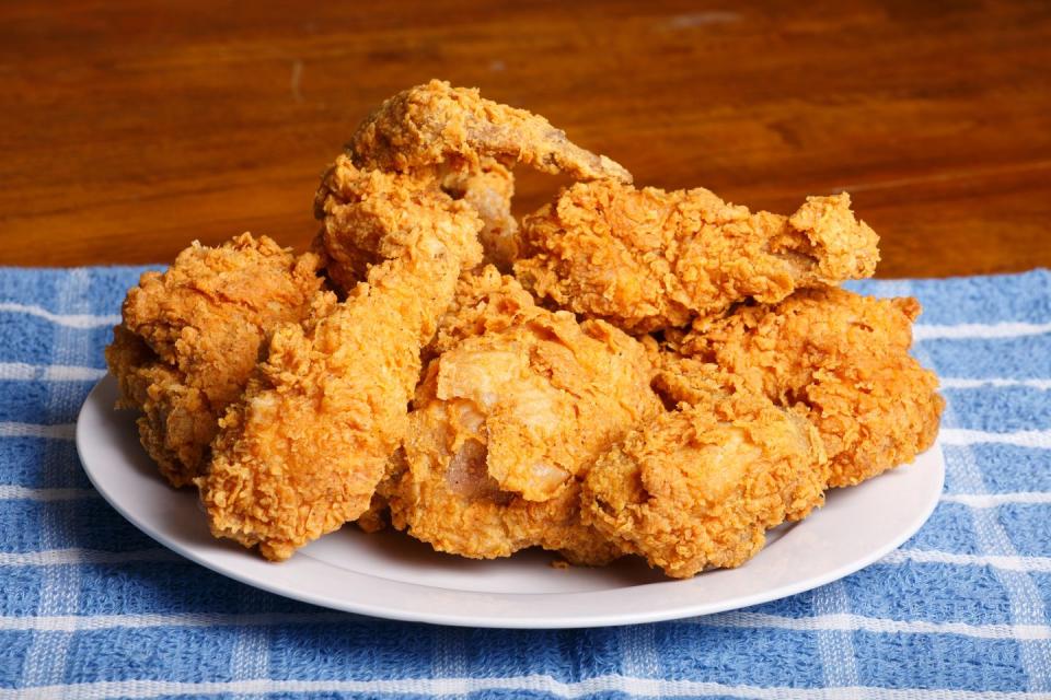 <p>No one can deny how delicious fried chicken is. What it packs in deliciousness, it also packs in calories. One fried chicken thigh has about 162 calories. If we're honest with ourselves, we know we eat way more than one thigh accompanied by another calorie-packed, but delicious side. </p>