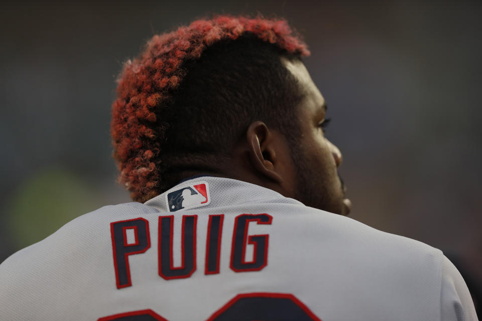 Cleveland Indians right fielder Yasiel Puig is seen in the dugout during the fourth inning of a baseball game against the Detroit Tigers, Wednesday, Aug. 28, 2019, in Detroit. (AP Photo/Carlos Osorio)