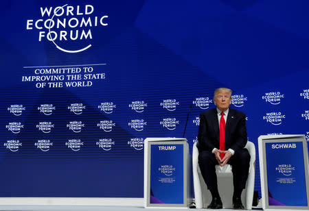 FILE PHOTO: U.S. President Donald Trump attends the World Economic Forum (WEF) annual meeting in Davos, Switzerland January 26, 2018. REUTERS/Carlos Barria/File Photo