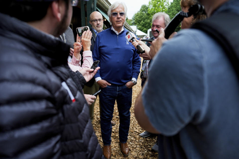 Trainer Bob Baffert speaks with reporters ahead of the 149th running of the Preakness Stakes horse race at Pimlico Race Course, Friday, May 17, 2024, in Baltimore. (AP Photo/Julia Nikhinson)