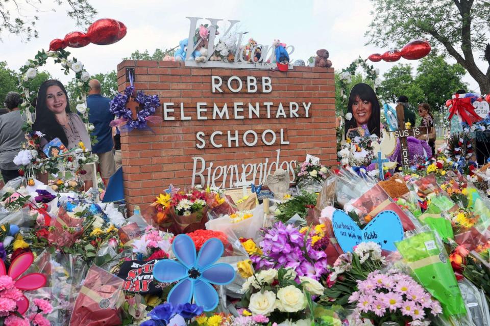 PHOTO: People visit a memorial for the 19 children and two adults killed on May 24th during a mass shooting at Robb Elementary School on May 30, 2022, in Uvalde, Texas. (Michael M. Santiago/Getty Images, FILE)