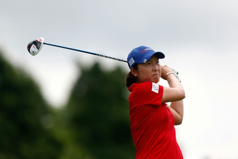 Candie Kung of Taiwan hits her tee shot on the fourth hole during the four-ball session of the 2016 UL International Crown, at the Merit Club in Chicago, Illinois, on July 23