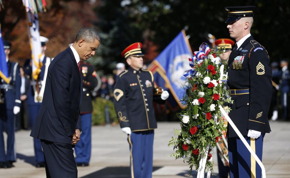 U.S. President Obama lays a wreath at the Tomb of the Unknowns on Veterans Day at Arlington National Cemetery in Washington