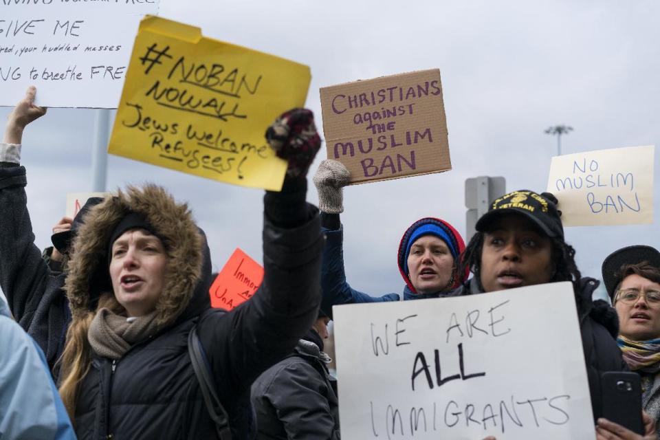 Protesters assemble at John F. Kennedy International Airport in New York, Saturday, Jan. 28, 2017 after two Iraqi refugees were detained while trying to enter the country. On Friday, Jan. 27, President Donald Trump signed an executive order suspending all immigration from countries with terrorism concerns for 90 days. Countries included in the ban are Iraq, Syria, Iran, Sudan, Libya, Somalia and Yemen, which are all Muslim-majority nations. (AP Photo/Craig Ruttle)