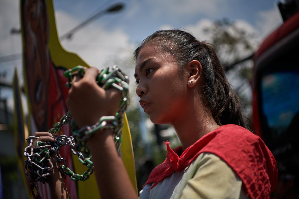 <p>Protesters march to mark International Women’s Day in Manila in the Philippines</p> (Getty Images)