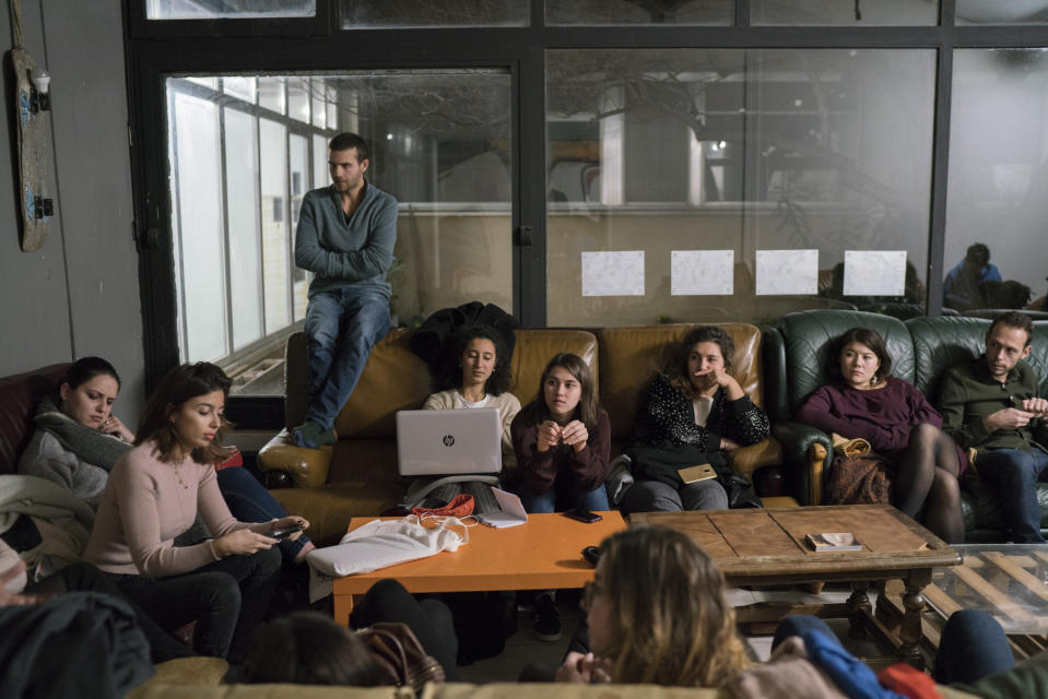 In this photo taken Dec.13, 2019, members of the Autonomous Union for Interns of the Hospitals of Marseille gather for a general assembly at the interns residency at Marseille's La Timone hospital to organize their ongoing strike in Marseille, southern France. In a hospital in Marseille, student doctors are holding an exceptional, open-ended strike to demand a better future. France’s vaunted public hospital system is increasingly stretched to its limits after years of cost cuts, and the interns at La Timone - one of the country’s biggest hospitals - say their internships are failing to prepare them as medical professionals. Instead, the doctors-in-training are being used to fill the gaps. (AP Photo/Daniel Cole)