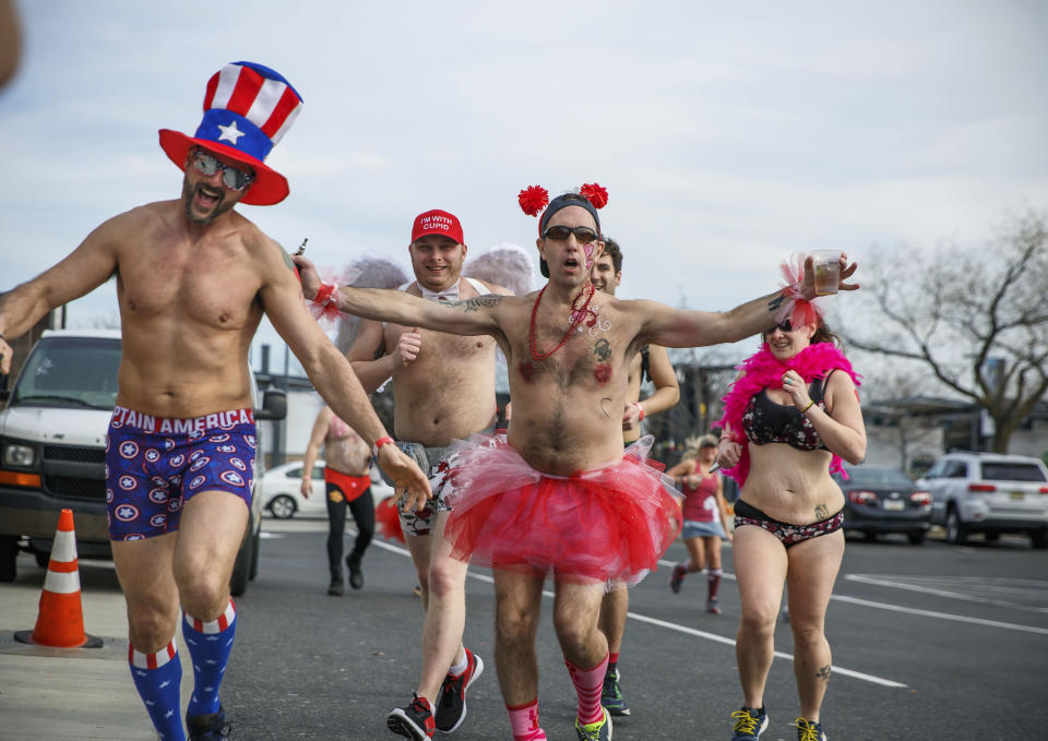 In this photo provided by Jamie Kassa, participants race in the annual Cupid's Undie Run, Saturday, Feb. 18, 2017, in Philadelphia. In briefs, boxers, bras and bloomers, participants ran three-quarters of a mile in the Valentine's Day-related charity event benefiting sick children. (Jamie Kassa via AP)