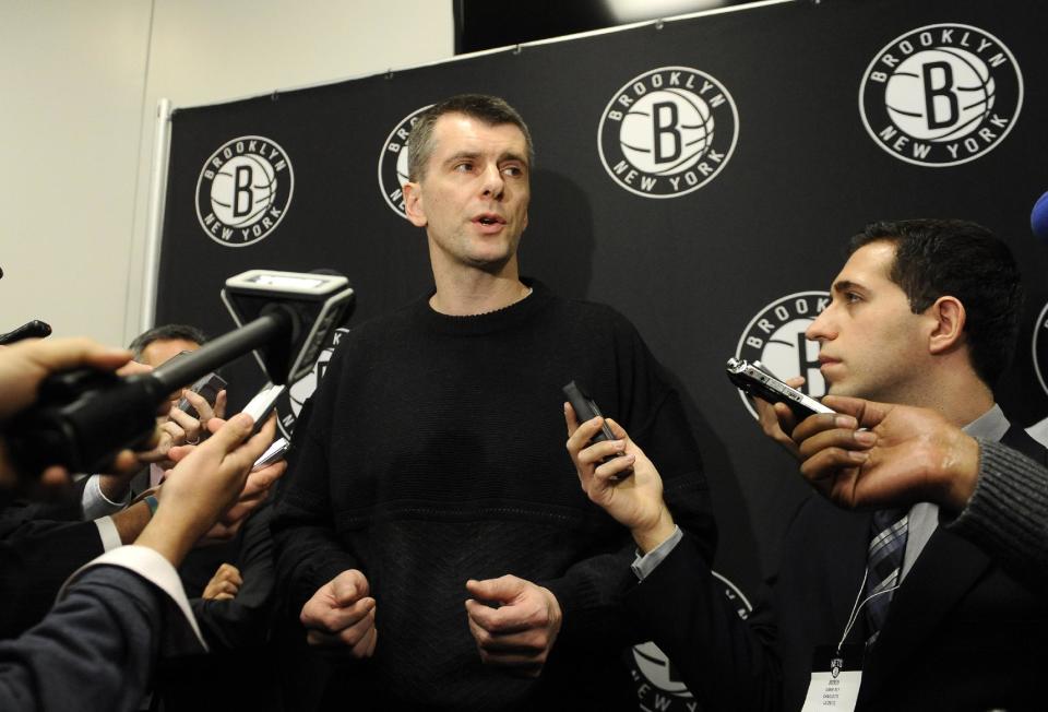 Brooklyn Nets owner Mikhail Prokhorov speaks with the media. (AP Photo)