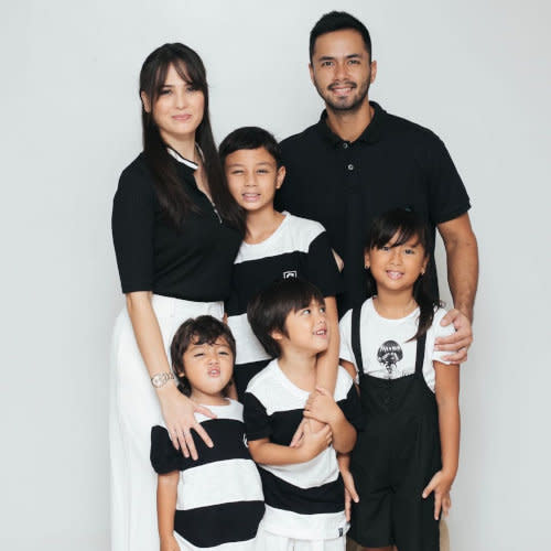 The couple with their children; daughter Ondrea and sons Kristian (Kiel), Kaleb, and Marvic.