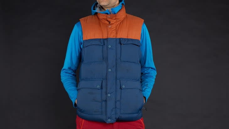 <span class="article__caption">The vest comes in four colors: Dark Ale Colorblock, Charcoal, Walnut Colorblock, and Dark Sky Colorblock (shown)</span> (Photo: Brad Kaminski | Outside)