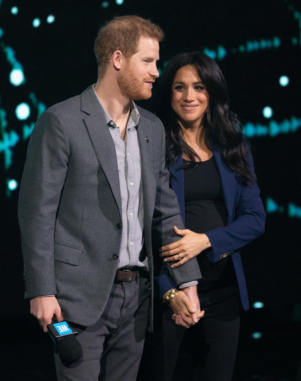 LONDON, ENGLAND - MARCH 06: Prince Harry, Duke of Sussex and Meghan, Duchess of Sussex on stage at We Day UK at SSE Arena on March 06, 2019 in London, England. (Photo by Jo Hale/Redferns)