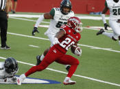 Fresno State running back Ronnie Rivers picks up a long gain against Hawaii linebacker Darius Muasau during the first half of an NCAA college football game in Fresno, Calif., Saturday, Oct. 24, 2020. (AP Photo/Gary Kazanjian)