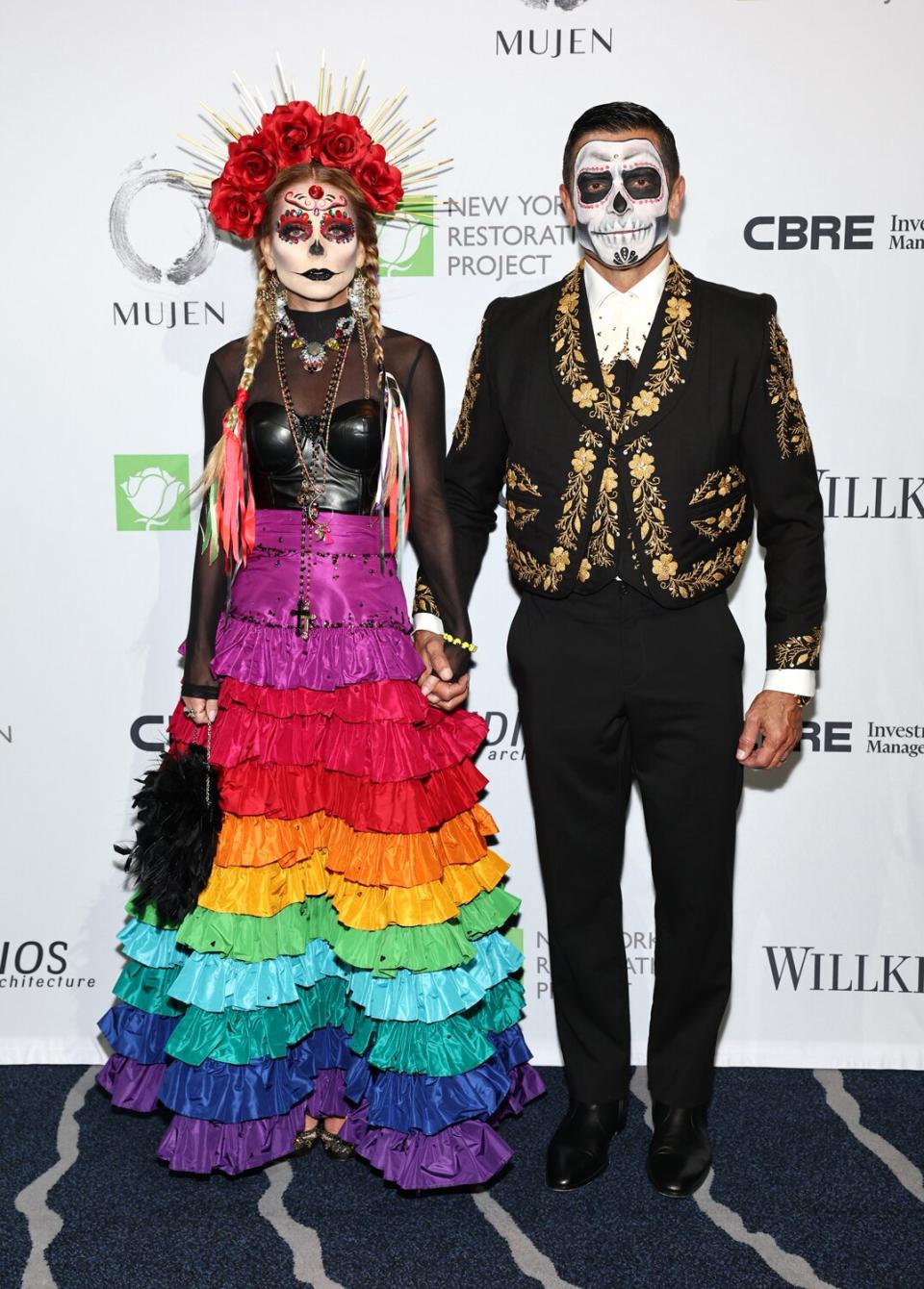 Kelly Ripa and Mark Consuelos attend Bette Midler's Annual Hulaween Bash at Cipriani South Street on October 27, 2023 in New York City.