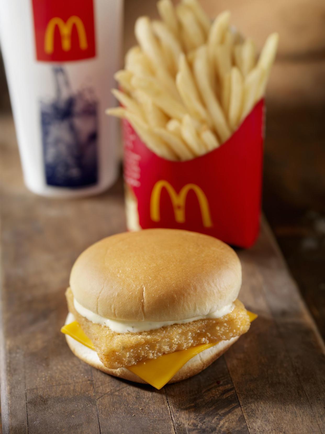 Calgary, Canada - March 15, 2011: McDonalds Fillet of Fish Meal. Shot in a photography studio on a wood table.