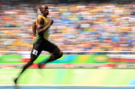 Usain Bolt of Jamaica competes in the 200m. REUTERS/Dominic Ebenbichler