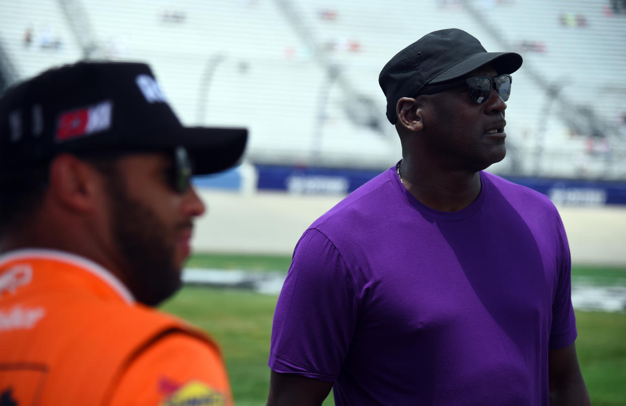 Bubba Wallace and Michael Jordan. (Christopher Hanewinckel/USA TODAY Sports)