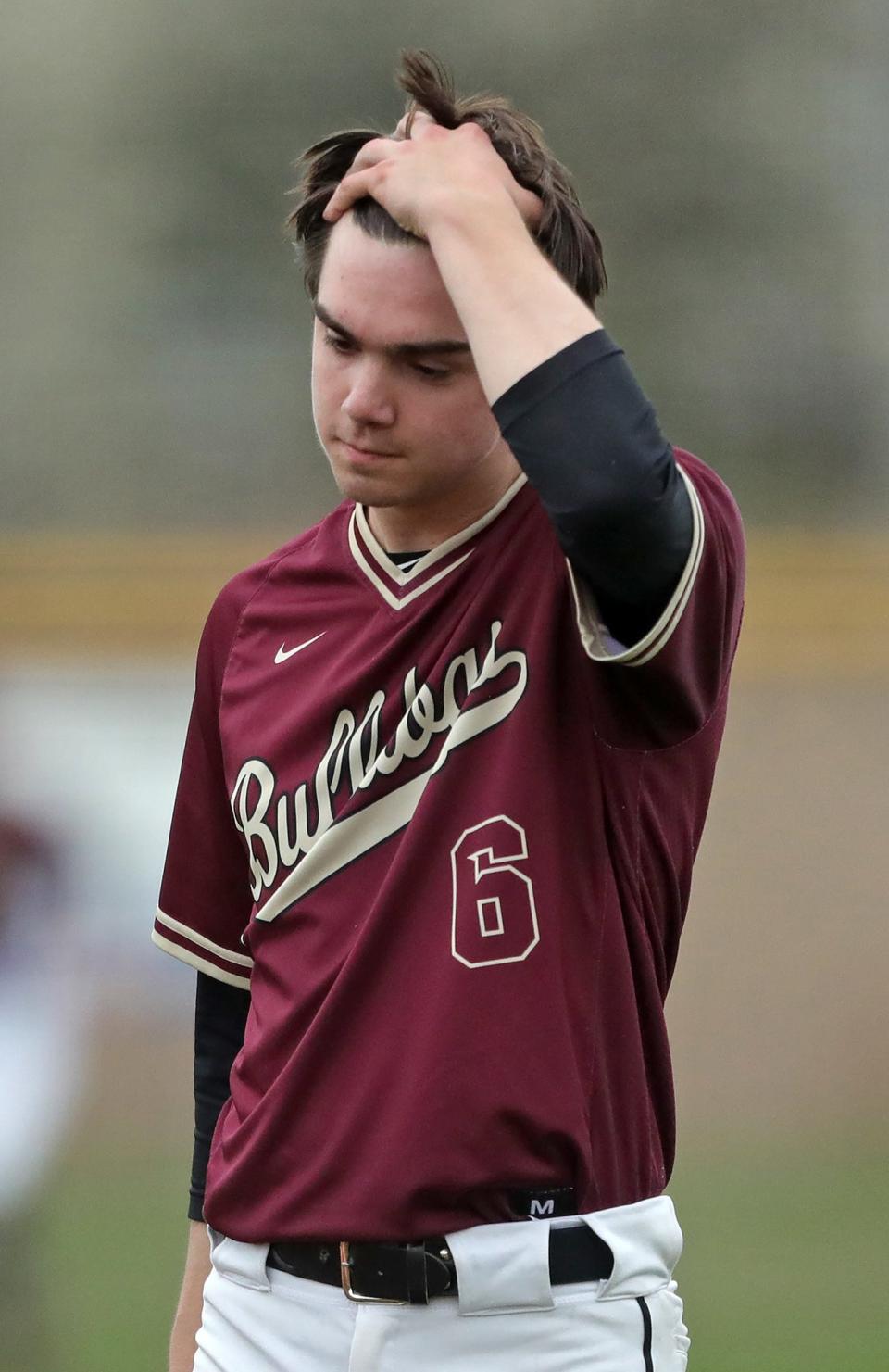 Stow reliever Josh Kupetz reacts as he comes off the field after the Twinsburg Tigers scored 3 runs to take the lead in the top of the seventh inning of a baseball game on Friday in Stow.