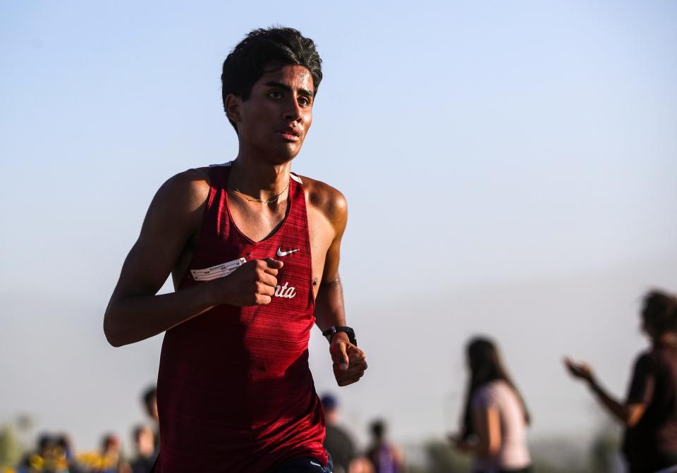 La Quinta's Martin Torres-Sandoval wins the boys' race of the first DEL cross country meet of the year at Xavier College Preparatory High School in Palm Desert, Calif., Wednesday, Sept. 20, 2023.