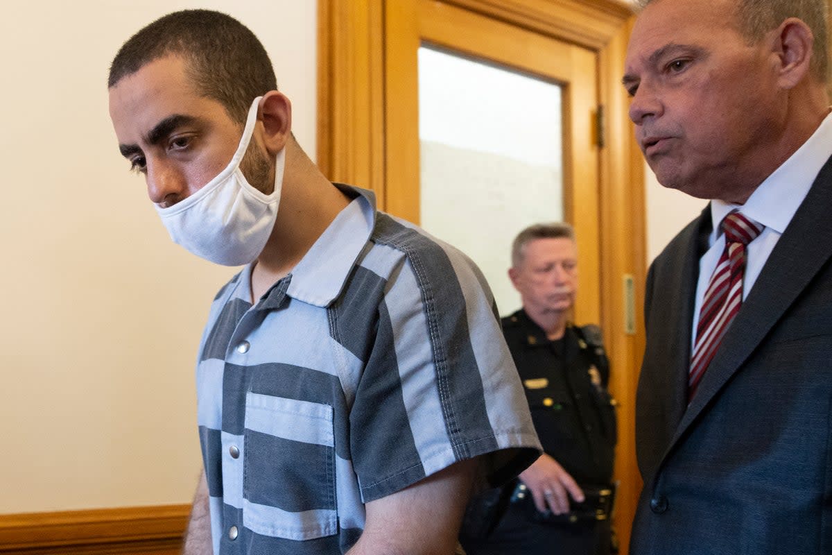 Hadi Matar, 24, left, and defense attorney Nathaniel Barone, right, talk after an arraignment in the Chautauqua County Courthouse in Mayville, N.Y., Thursday, Aug. 18, 2022. Matar was arrested Aug. 12 after he rushed the stage at the Chautauqua Institution and stabbed Salman Rushdie in front of a horrified crowd. (AP Photo/Joshua Bessex) (AP)