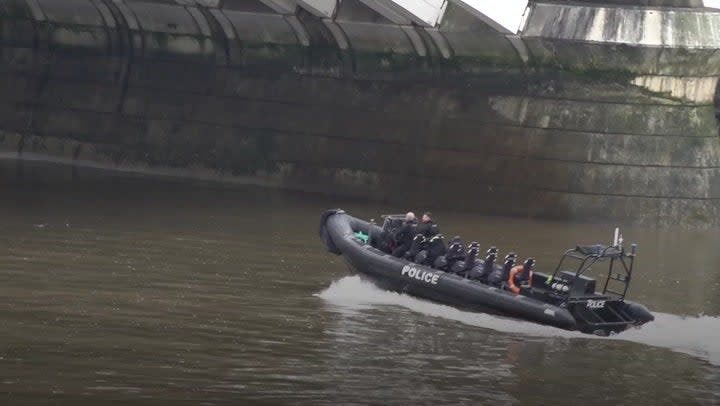 Police boats search the Thames near Chelsea Bridge for alkali attack suspect Abdul Ezedi (PA)