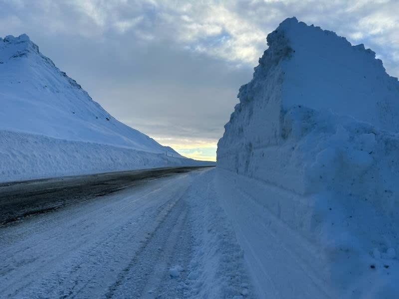 A cleared section of Haines Road or Highway 3 in an update posted to social media on Jan. 5. The road reopened on Jan. 6 after a nearly two week closure that left communities on both sides of the border isolated.  (Yukon Highway and Public Works  - image credit)