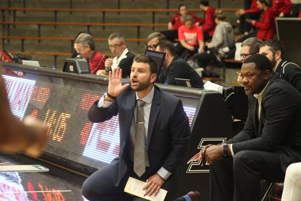 Former UIndy assistant coach John Spruance follwoed Stan Gouard to the University of Southern Indiana.