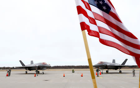 U.S. flag flutters next to the U.S. Air Force F-35A Lightning II fighter in Amari air base, Estonia, April 25, 2017. REUTERS/Ints Kalnins