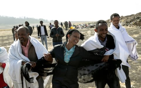 Kebebew Legesse, the mother of Ethiopian Airlines cabin crew Ayantu Girmay mourns at the scene of the Ethiopian Airlines Flight ET 302 plane crash - Credit: REUTERS/Baz Ratner