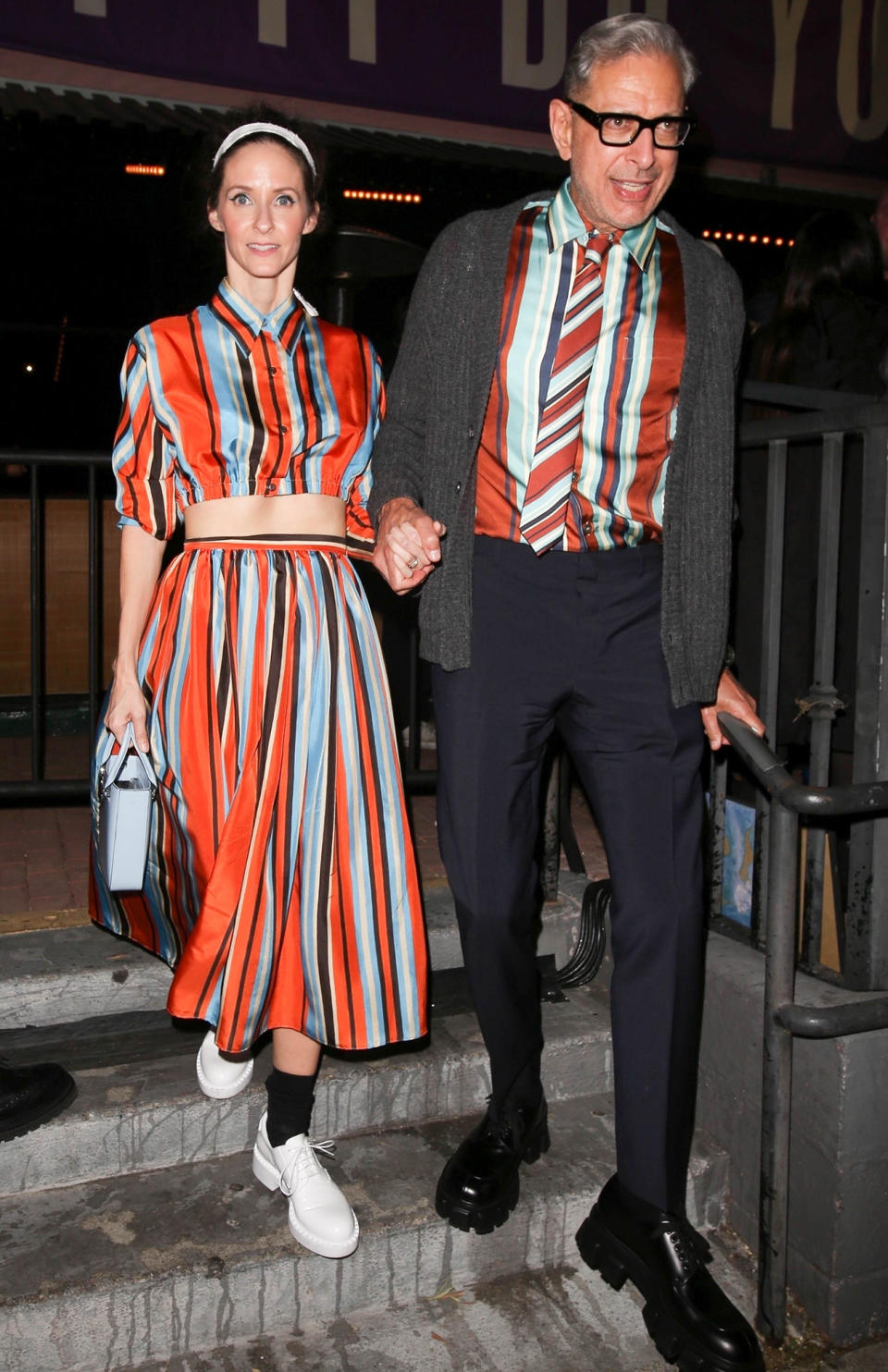 <p>Goldblum and his wife, Emilie Livingston were a power couple in Prada, matching in striped ensembles at an event for the designer in Feb. 2022. </p>