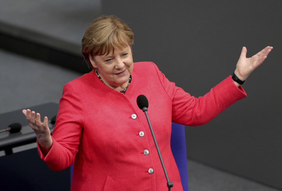 German Chancellor Angela Merkel takes questions as part of a meeting of the German federal parliament, Bundestag, at the Reichstag building in Berlin, Germany, Wednesday, July 1, 2020. (AP Photo/Michael Sohn)