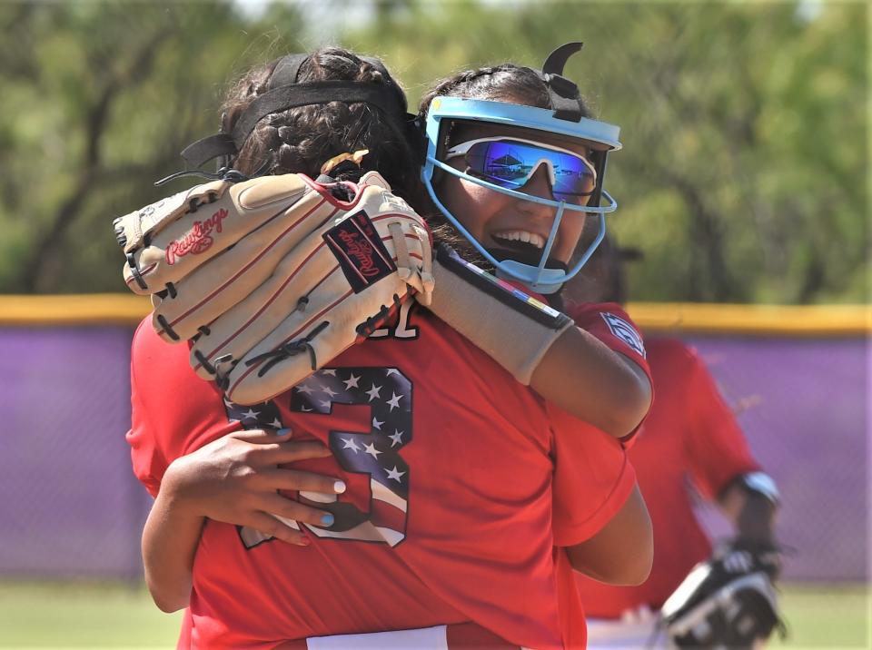 Greater Helotes players celebrate their 3-2 victory over Corpus Christi National in the ages 9-11 opener at the Texas West State Little League Softball Tournament on Wednesday, July 12, 2023, at the Wylie Little League Complex at Kirby Lake Park. The win gives Helotes a 1-0 lead in the best-of-three series.