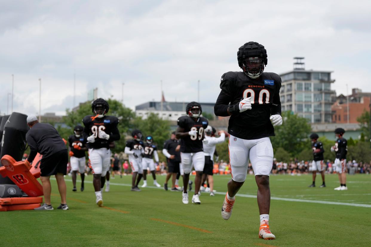 The Cincinnati Bengals defense runs to another field during training camp practice at the Paycor Stadium practice facility in downtown Cincinnati on Wednesday, Aug. 10, 2022.