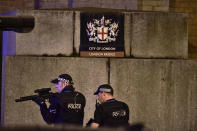 <p>Armed Police officer looks through his weapon on London Bridge as police are dealing with a “major incident” at London Bridge. (Dominic Lipinski/PA Images via Getty Images) </p>