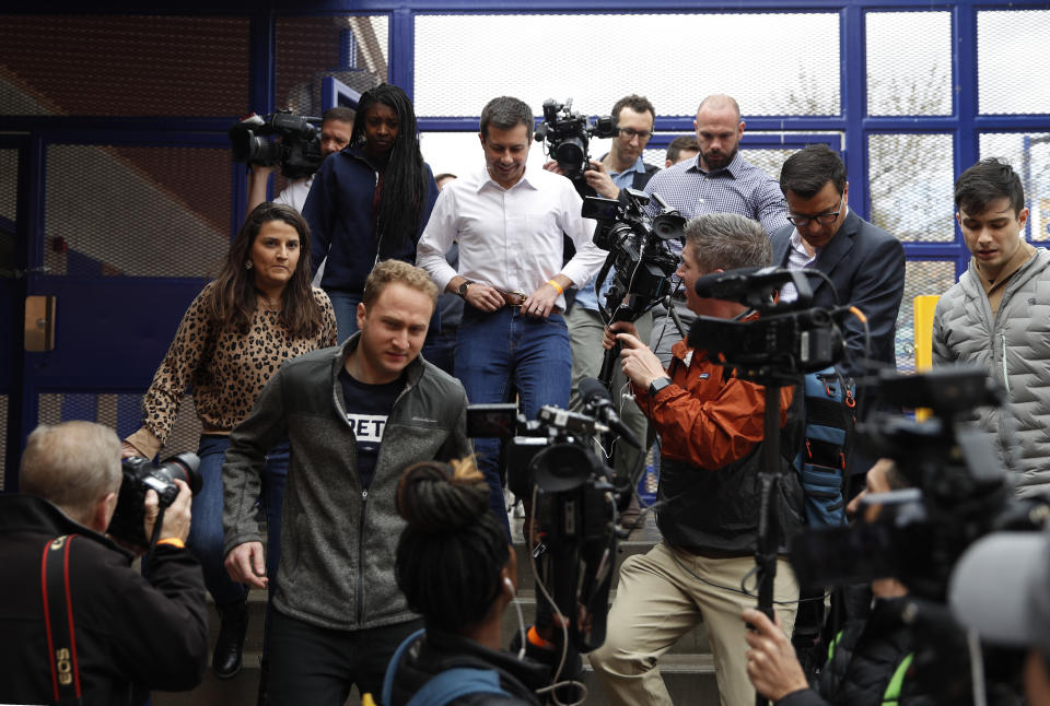 Democratic presidential candidate former South Bend, Ind., Mayor Pete Buttigieg is surrounded by media as he visits a caucus site Saturday, Feb. 22, 2020, in Las Vegas. (AP Photo/John Locher)