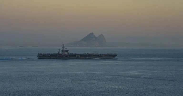 A photo obtained from the US Department of Defense shows the USS Dwight D. Eisenhower aircraft carrier transiting the Strait of Gibraltar on October 28, 2023 (Merissa Daley)
