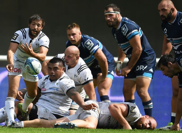 Brive's French scrum-half Teddy Iribaren (L) was sent to the sinbin for a deliberate knock-on
