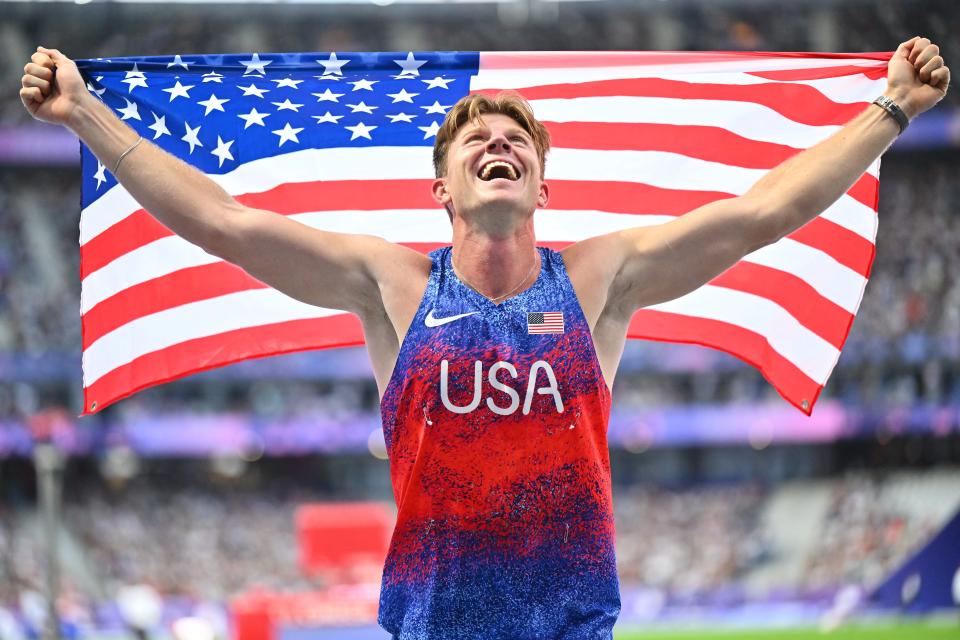 PARIS, FRANCE - SEPTEMBER 06: Hunter Woodhall of Team USA celebrates after winning the Gold Medal in the Men's 400m T62 on day nine of the Paris 2024 Summer Paralympic Games at Stade de France on September 06, 2024 in Paris, France. (Photo by Marco Mantovani/Getty Images)