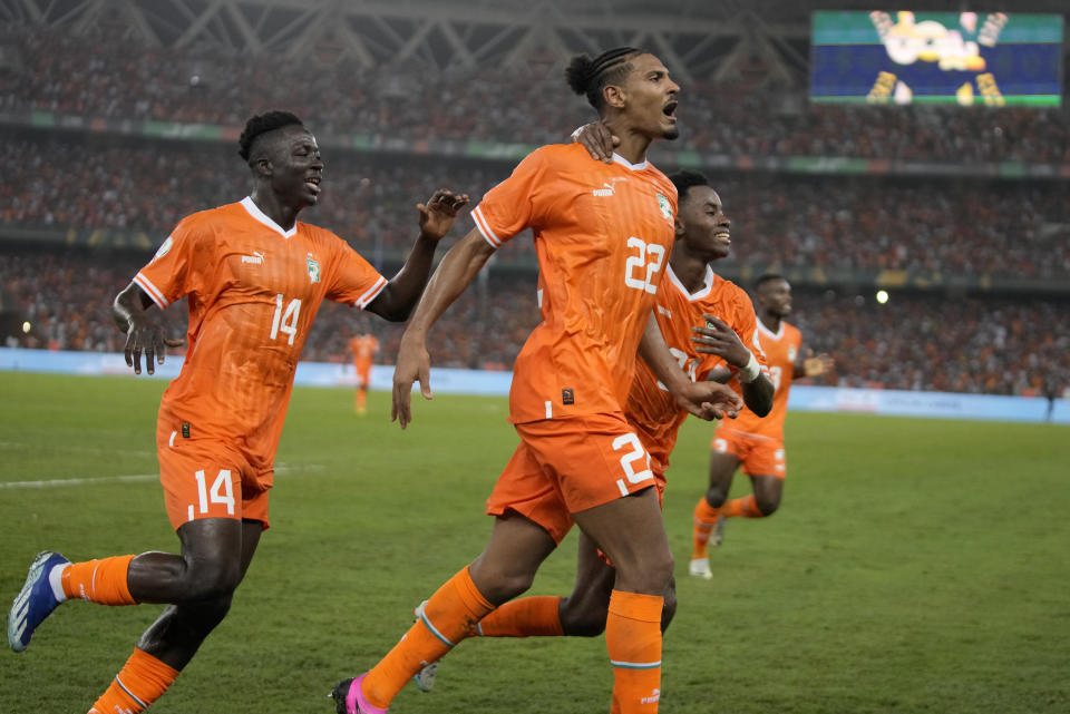 Ivory Coast 's Sebastien Haller celebrates after scoring his side's second goal during the African Cup of Nations final soccer match between Ivory Nigeria and Coast, at the Olympic Stadium of Ebimpe in Abidjan, Ivory Coast, Sunday, Feb. 11, 2024. (AP Photo/Themba Hadebe)