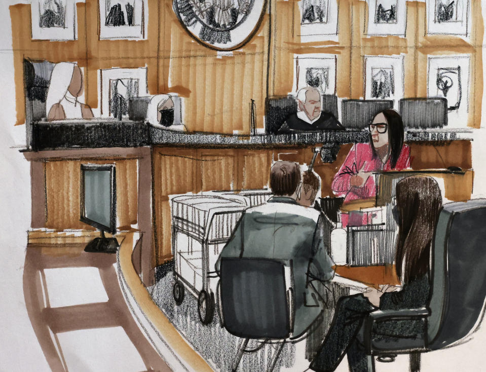 In this courtroom sketch, a woman who goes by pseudonym “Jane”, left, testifies in R. Kelly's trial in federal court, Friday, Aug. 19, 2022, in Chicago. (Cheryl Cook via AP)