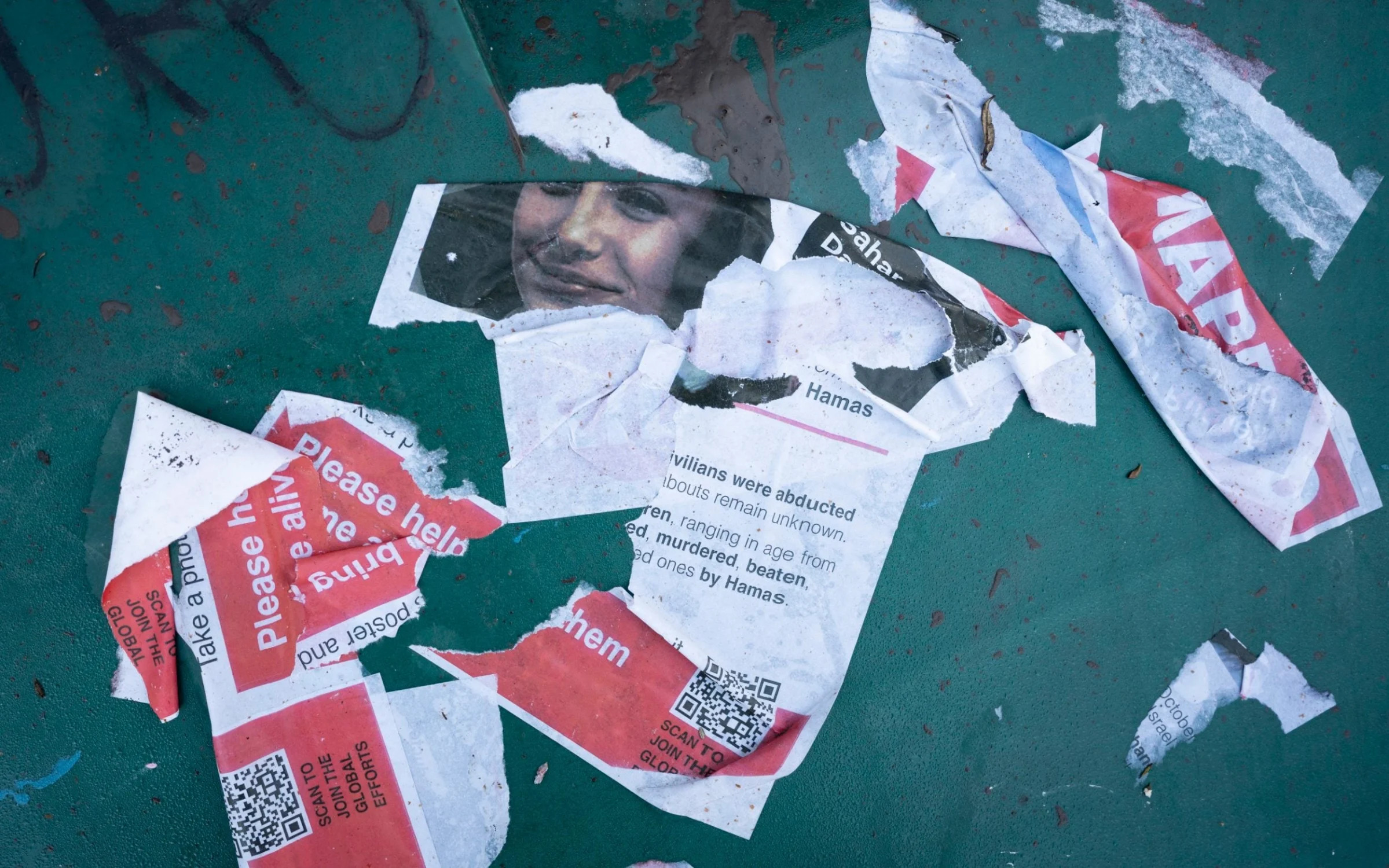 Flyer and poster showing the face of an Israeli hostage seized by Hamas is seen after being damaged, torn and defaced at Waterloo, on 13th November 2023, in London, England.